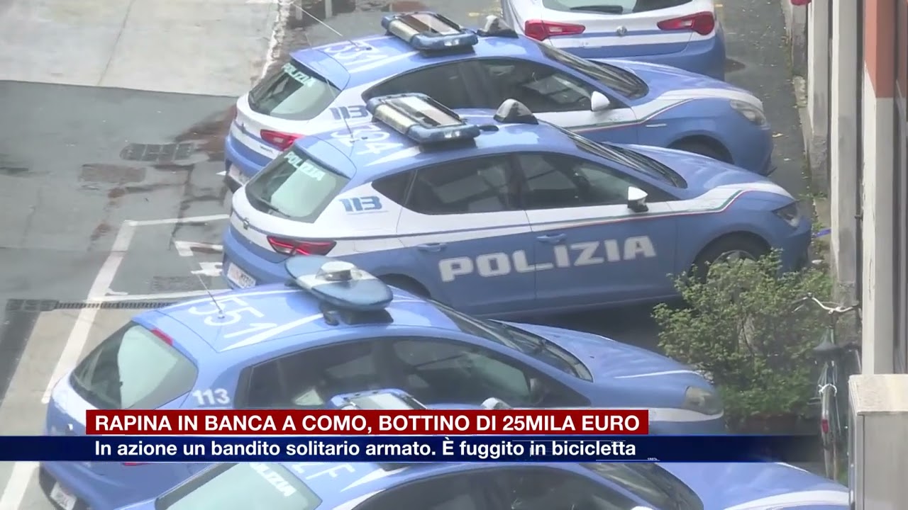Etg - Barba e baffi finti, rapinatore assalta la banca a Como e fugge in bici con 25mila euro